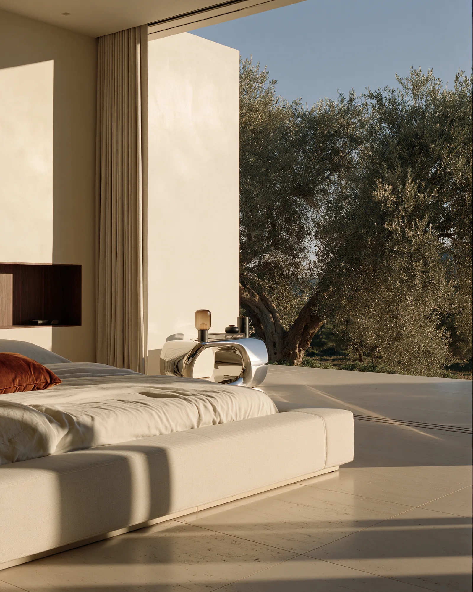 Bedroom at Son Vida House opening onto the terrace, a mature olive tree beyond